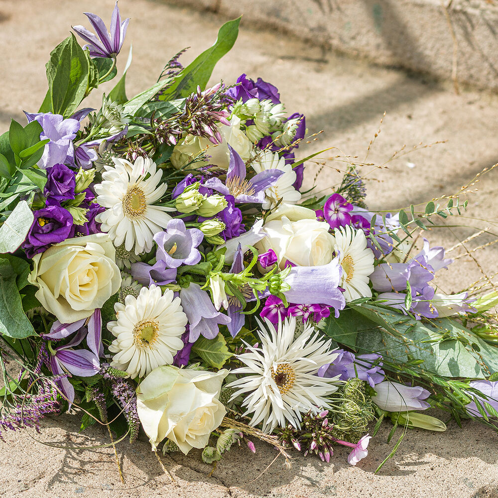 Green approved pastel funeral bouquet