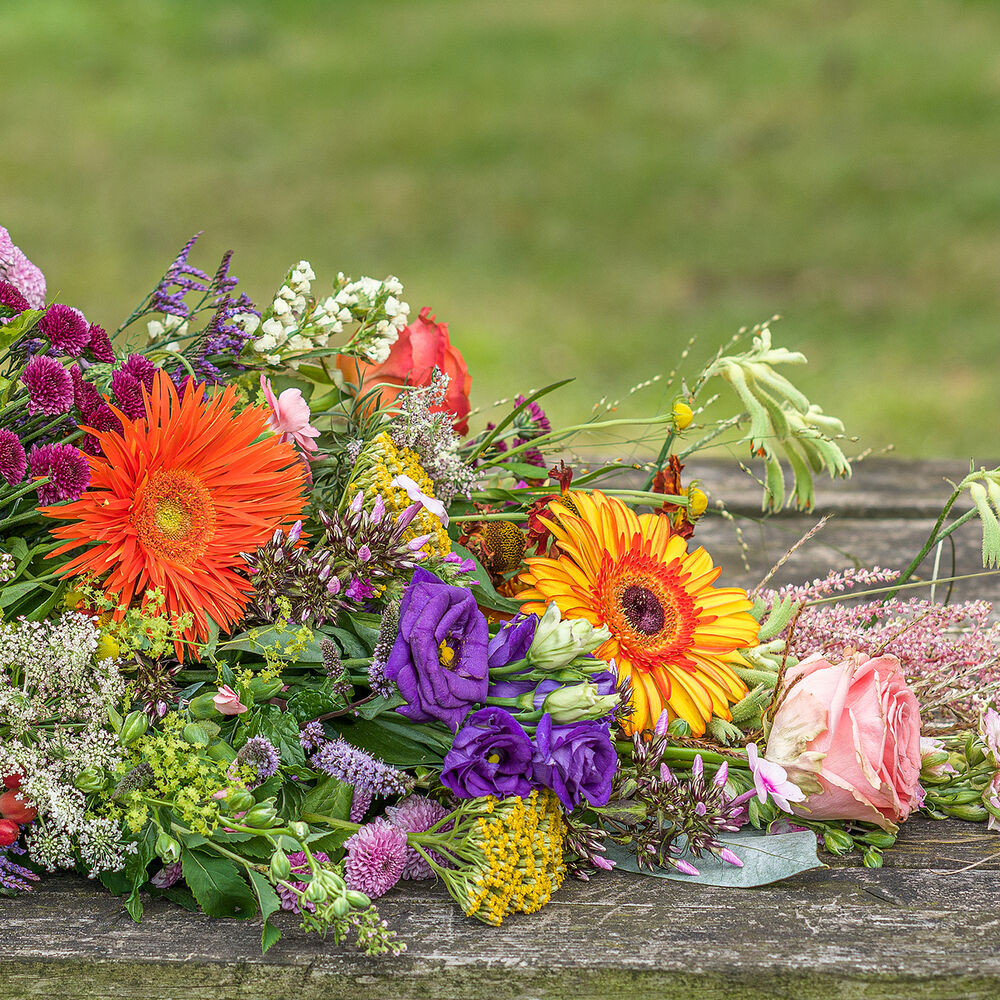 Green approved colorful funeral bouquet