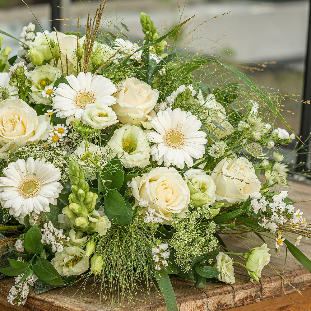 Green approved white funeral arrangement